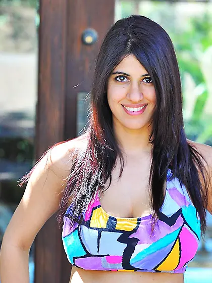 Playful Asian girl shows ass in tiny shorts and also big melons