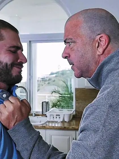 Long-haired brunette sucks cock