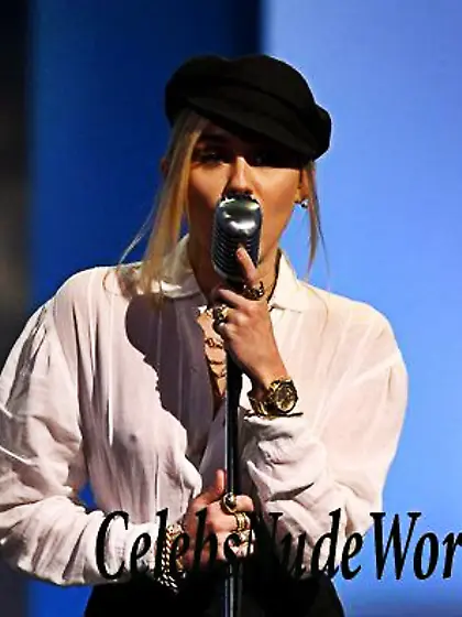 Miley Cyrus Braless In A See Thru Blouse While Performing