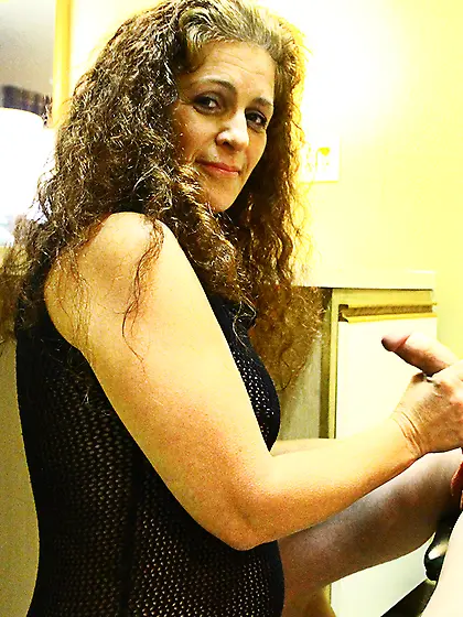 See the topless woman Lisa Brown skillfully jerking off the long