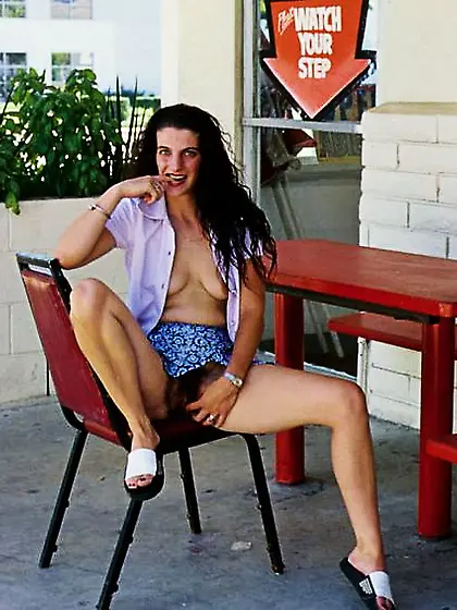 Smoking hot chick sits