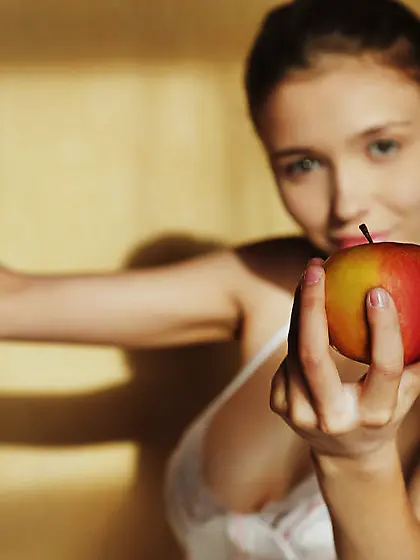 Food fetishist exposing her boobies and looking rather seductive