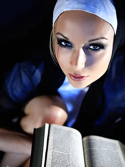 Busty brunette Kayden Kross is dressed as a nun but she is ready