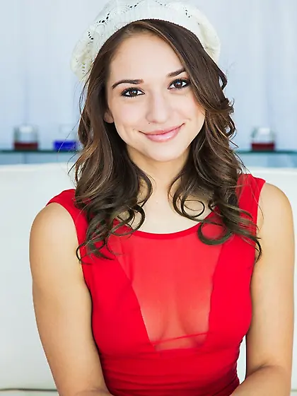 Latina sweet thing wears nothing but white knit cap and red canv