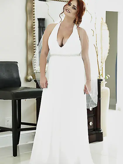 Gorgeous MILF with red hair takes white dress off baring appetiz