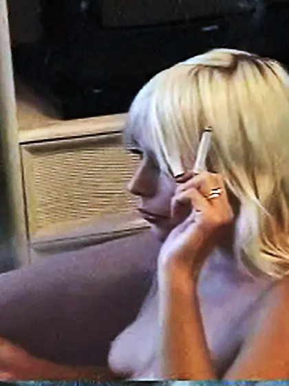 Blonde slut gets naked and enjoys in a cigarette