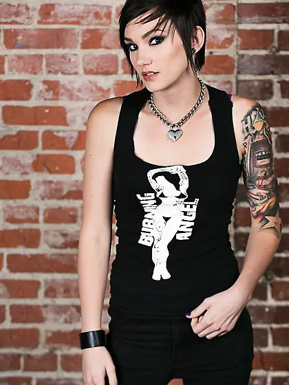 Girl with short hair and tattoos flashes small tits with nipple