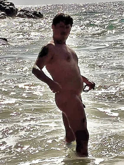 Man naked at the beach