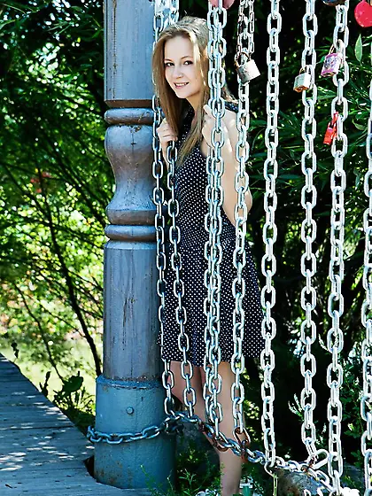 Seductive blonde with big naturals strikes a few alluring poses