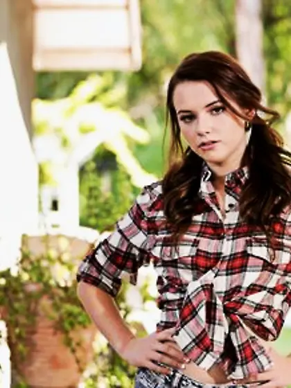 Lustful country-girl playfully gets rid of all clothes and poses