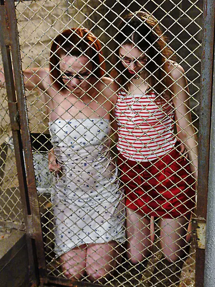 Locked in a cage and made to piss in a bucket