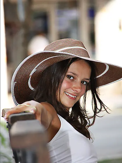 Margarita Mone is sitting on the rock with nude ass and spreadin