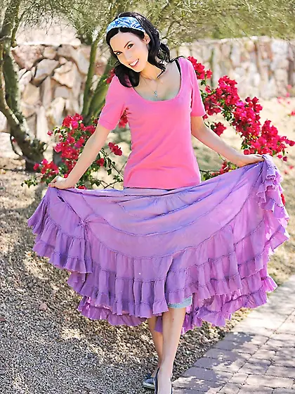 Slim Sophie FTV strips out of her black lingerie in the garden a