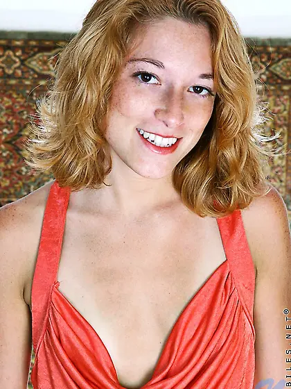 Tight teenage chick Lara Nubiles in red dress spreads her pink p