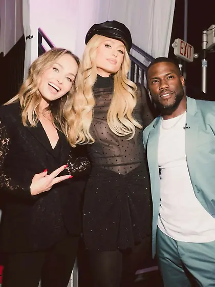 Paris Hilton in a sheer black top