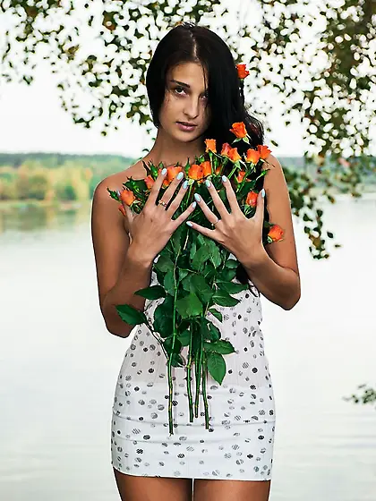 Naughty brunette chick Katya AC is posing with the nude bottom a