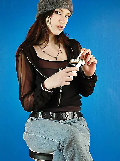 Punk rock girl smokes