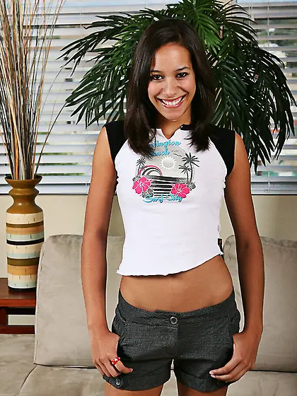 Tight dark haired hottie Courtney Page takes off her panties and