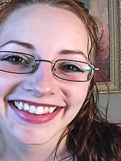 Nerdy blonde girl strips