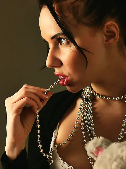 Sensual brunette corset strips