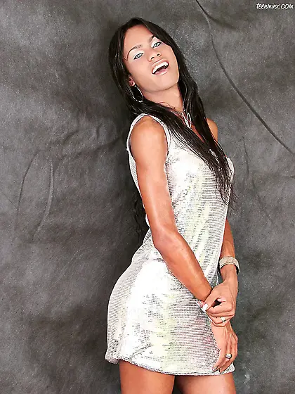 Stunning tgirl shows her assets