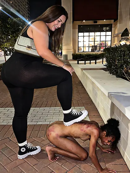 Pawg steps on a niggers back