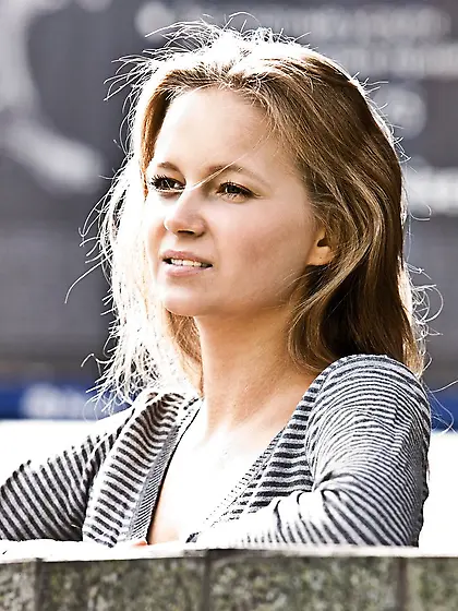 Blond-haired beauty shows her natural breasts in a legendary sol