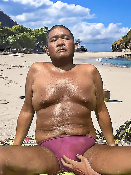 Kissing at the beach in our bikinis