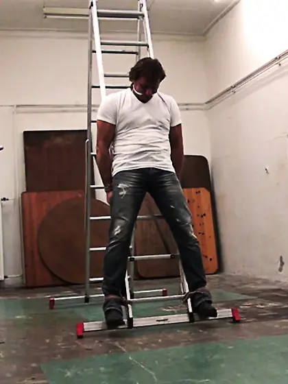 Guy white t-shirt strapped