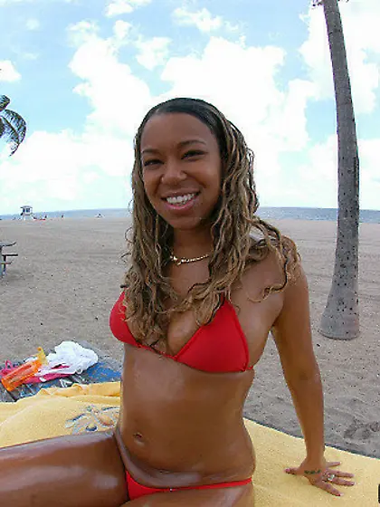 Oiled up exotic chick in red bikini riding her lover's meat