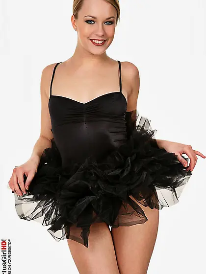 The salacious blonde babe Blue Angel turns back to cam and shows