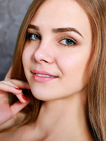 Blue-eyed,  leggy blonde takes off her blue corset and ankle sock