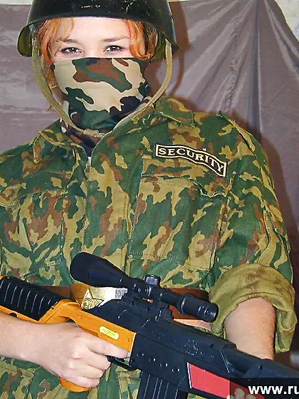 Russian teen in military uniform strips down