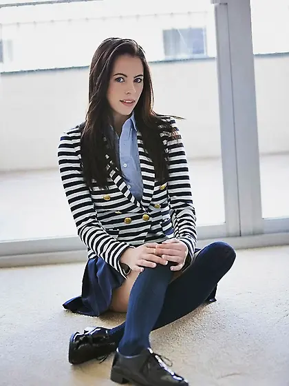 Pure blue-eyed tenderness gives a show of her fragile teen body