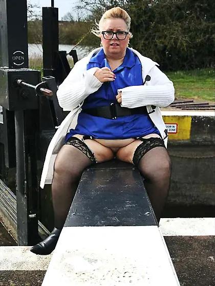 Mature nurse teases size