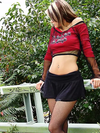 Ann Angel takes her sexy black skirt off and teases us with her