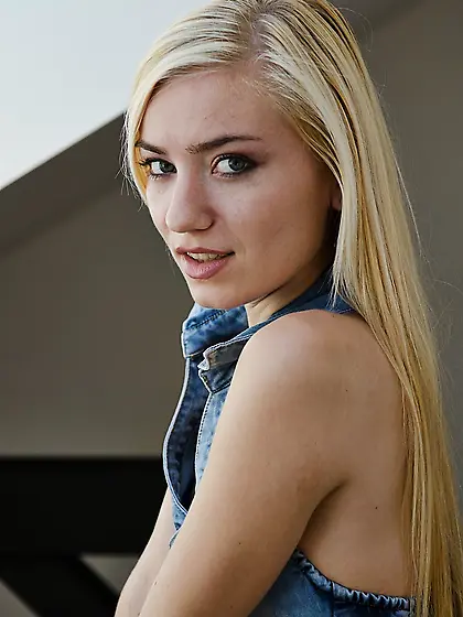 Blue-eyed blonde in denim shows her perfectly smooth pussy on ca