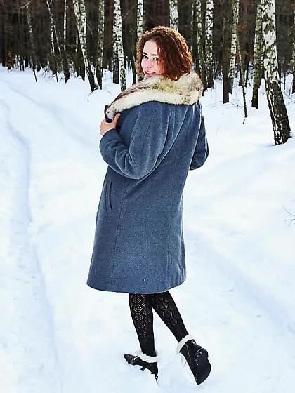 Tempered model with curly red hair isn't afraid of Russian winte