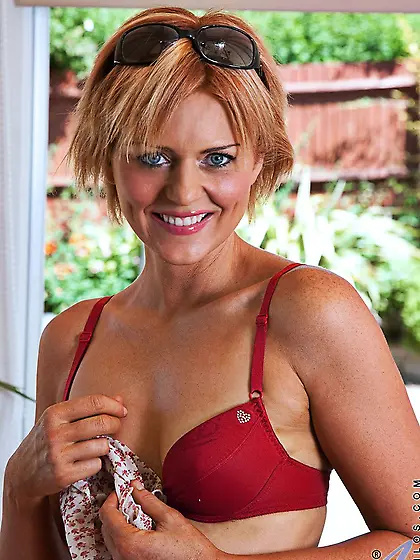 Baring her red lingerie frisky blonde Rebecca Anilos rubs her sm