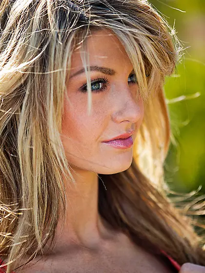 Blue-eyed blonde with tiny panties showing off her naughty side