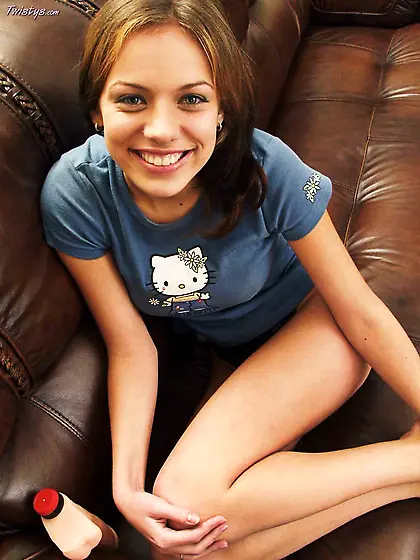 Smiling titty babe Babette strips her t-shirt and then lingerie