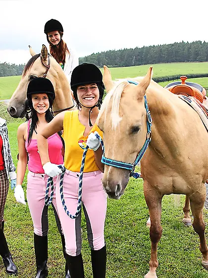Horse riding babes licking