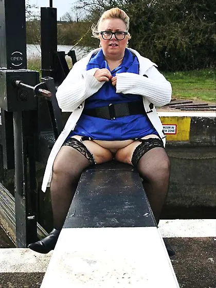 Mature nurse teases chubby